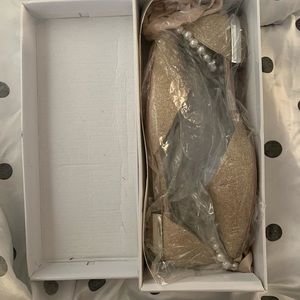 Gold glitter ballet flats.